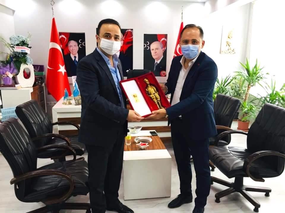 MHP İl başkanı Şanlıtürk'ü ziyaret ettiler