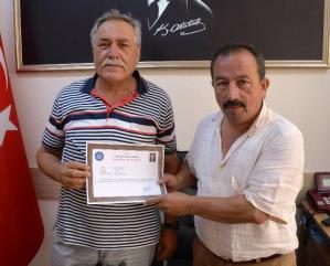 Kaymakam Yapıcı'dan muhtarlara takdir belgesi
