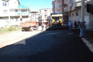 YAĞMURDAN UÇAN YOLUN TAMİRATI HEMEN YAPILDI